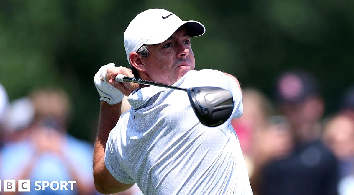 McIlroy improves to go joint-second as Clark retains lead