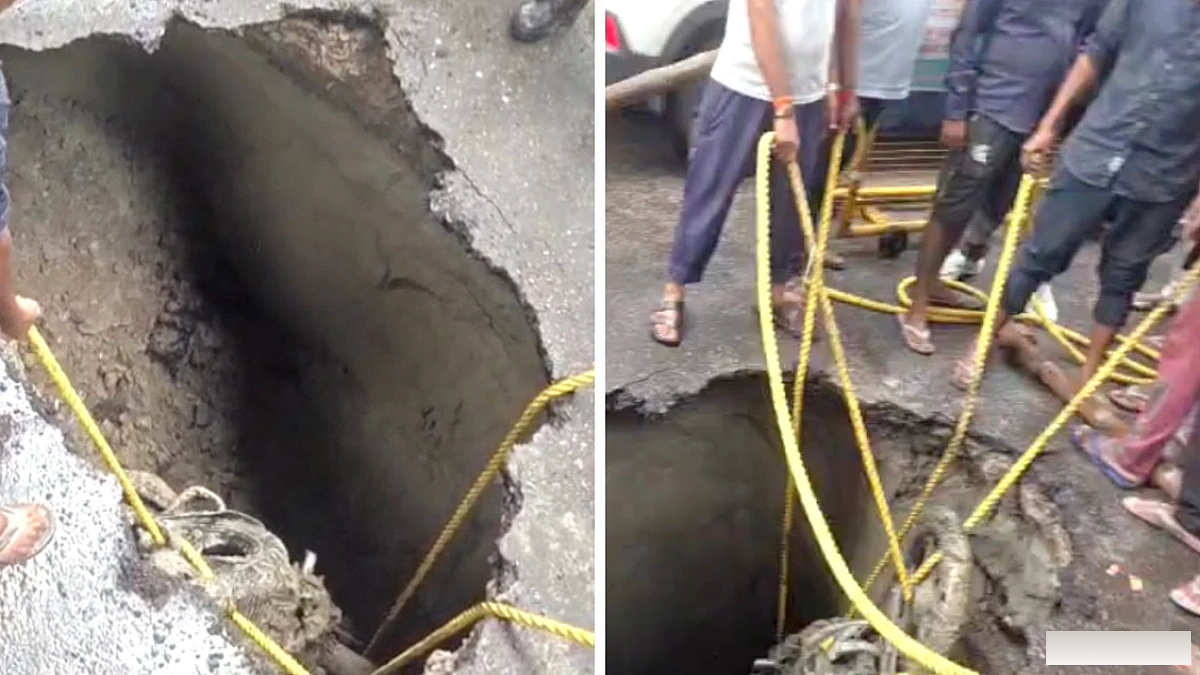 लखनऊ यूनिवर्सिटी के सामने सड़क में 12 फीट गड्ढा... बाइक समेत गिरा युवक